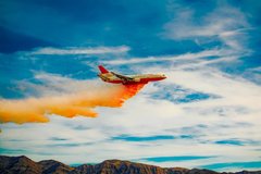 Фотообои Самолет и оранжевый дым Артикул nfi_02693