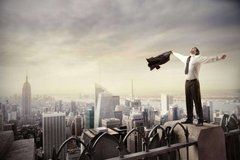 Фотообои Человек на вершине небоскреба Артикул 2038